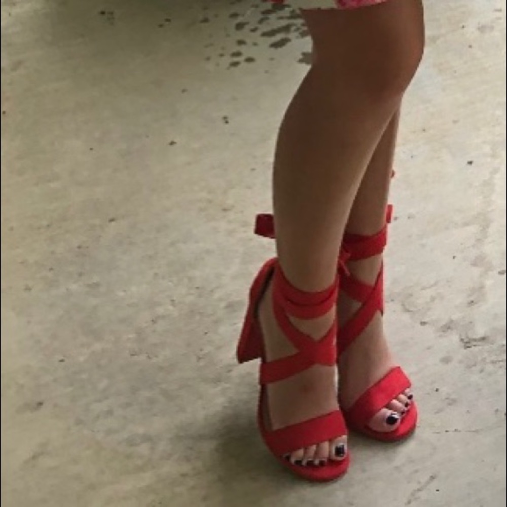 Red wrap around high heels